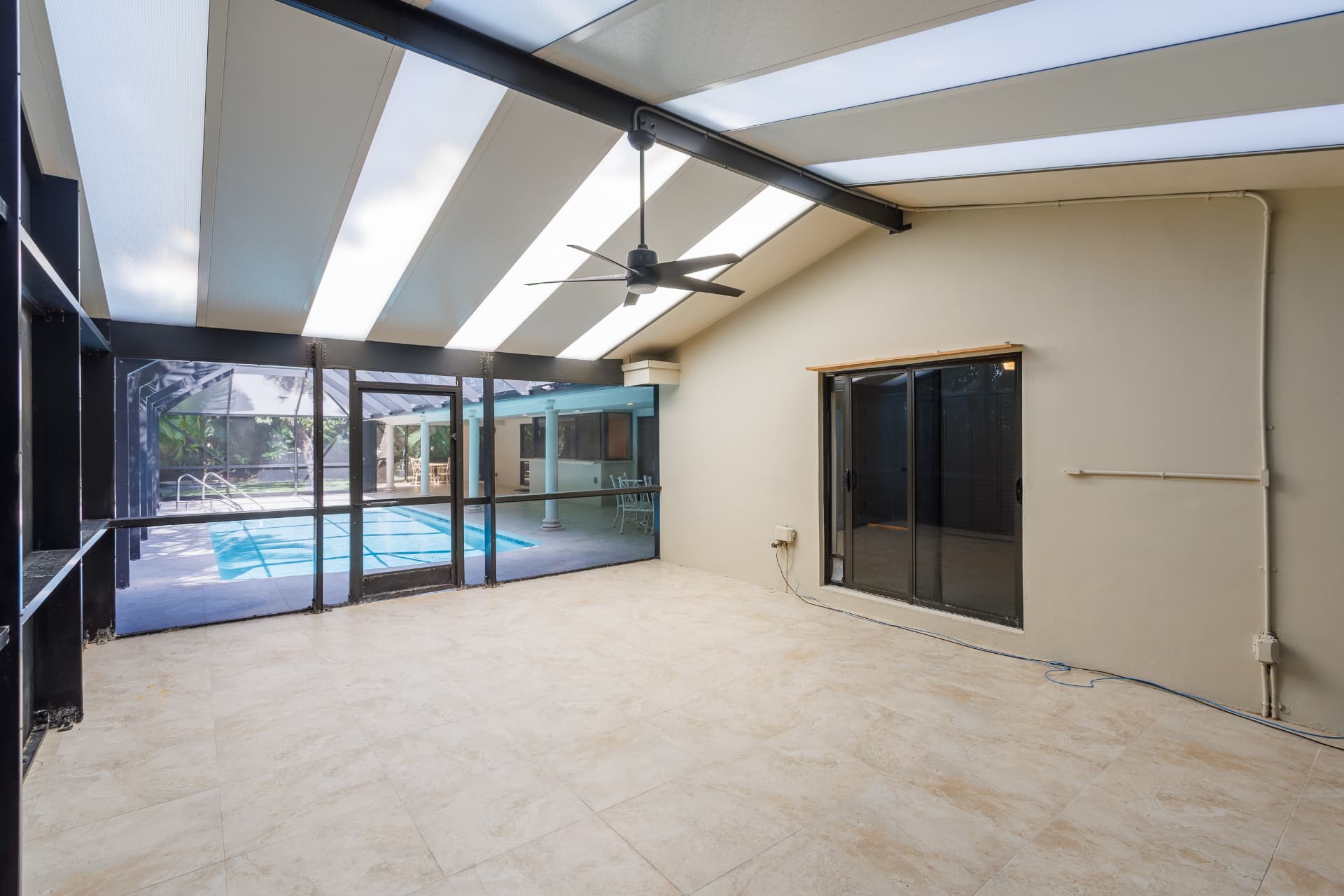 Covered lanai with skylights and ceiling fan