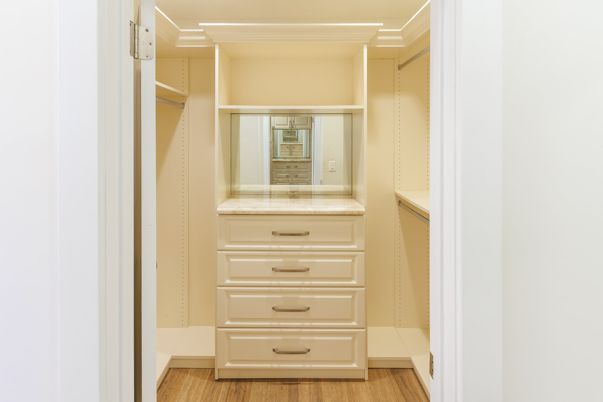 Custom walk-in closet with built-in drawers